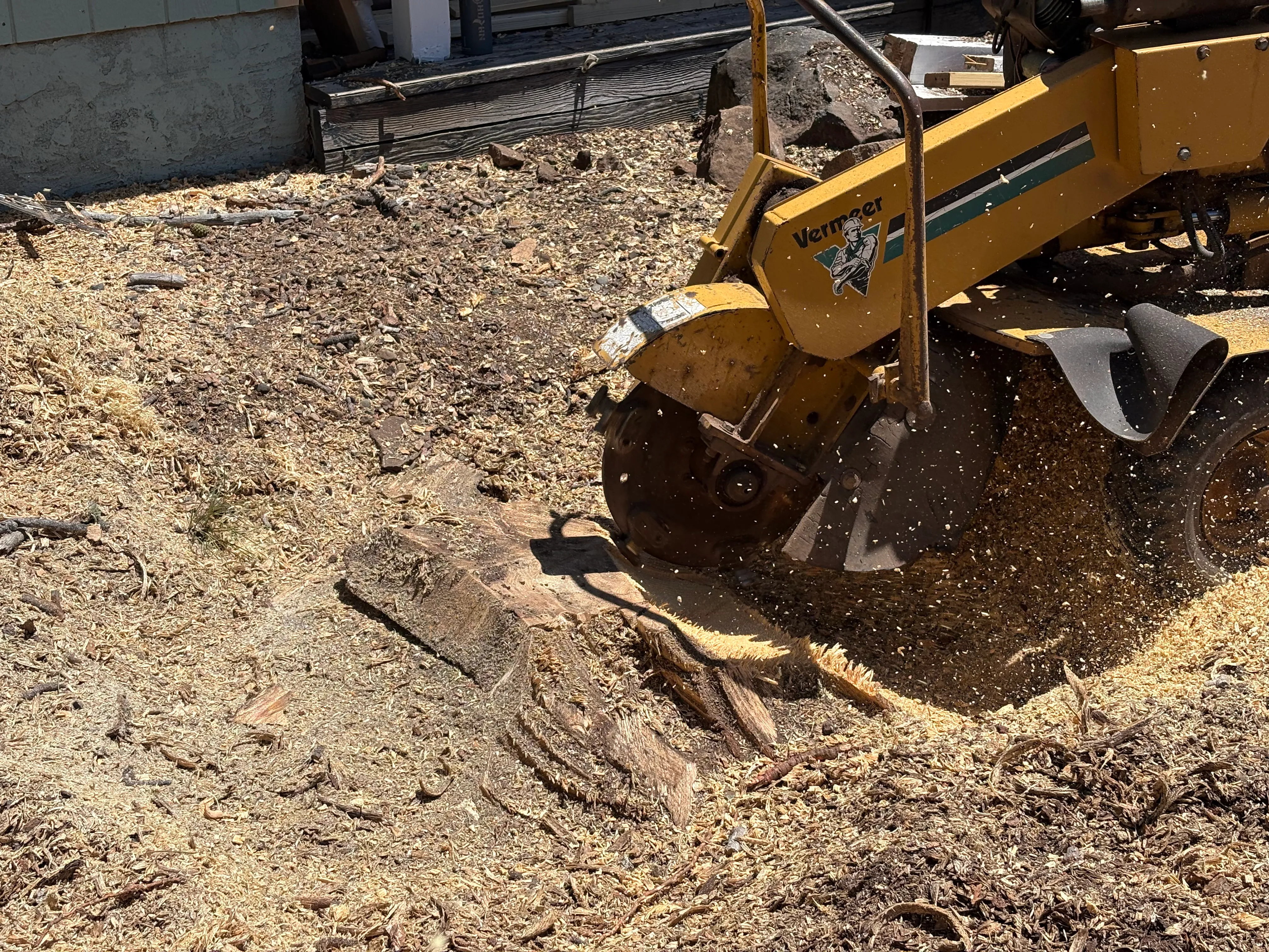 Grinding a stump below grade